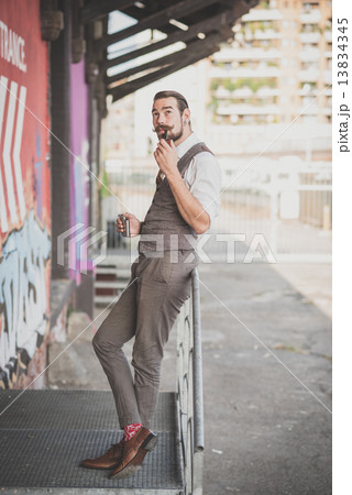 handsome big moustache hipster man smoking pipe 13834345
