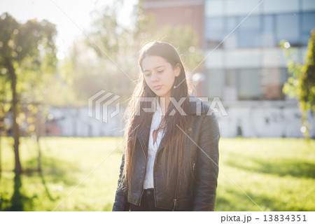 young beautiful long hair woman in town 13834351