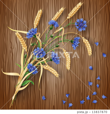 Cornflowers and wheat ears on wood background 13837870