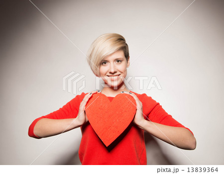 Valentine's Day. Love. Girl holding a heart Valentine's Day. Love. Girl holding a heart 13839364