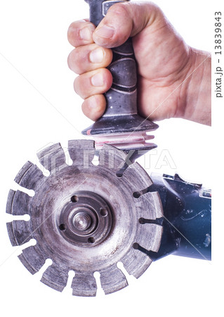 circular saw in male hand 13839843