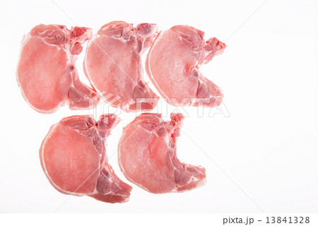 raw pork on a white background - copy space raw pork on a white background - copy space 13841328