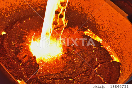 molten metal poured from ladle 13846731