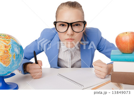 Angry Student with fists on table. Angry Student with fists on table. 13849073