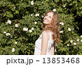 Photo of blonde girl with bright sincere smile standing near bri 13853468