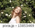 Photo of blonde girl with bright sincere smile standing near bri 13853469