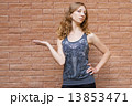 Photo of blonde girl thinking over the choice 13853471
