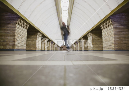 Blurred man on subway platform Blurred man on subway platform 13854324