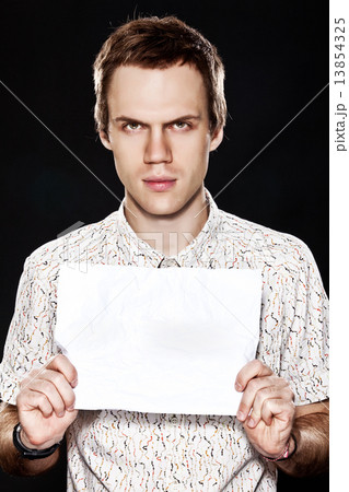 Handsome young man with cardboard Handsome young man with cardboard 13854325