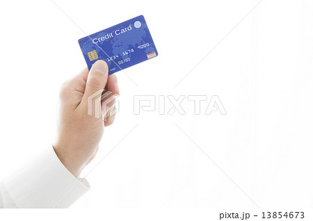 クレジットカードを持つ男性手元の写真素材