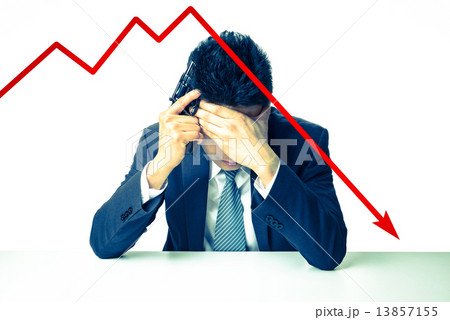 Depressed Businessman holding a gun behind bad Stock market char 13857155
