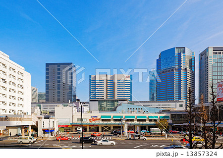 品川駅高輪口と青空の写真素材