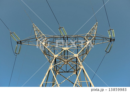 Large transmission towers at sunset 13859983