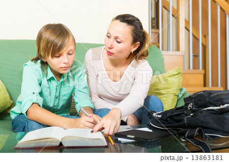 Mom and schoolboy son 13863181