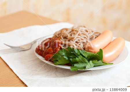 spaghetti pasta with sausages 13864009