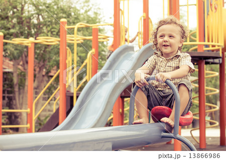 Happy little boy on the playground Happy little boy on the playground 13866986