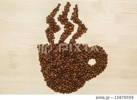 Coffee cup with steam made with coffee roasted beans on a wood Coffee cup with steam made with coffee roasted beans on a wood 13870039