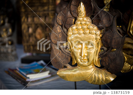 Traditional Thai style Lord Buddha's face wood carving Traditional Thai style Lord Buddha's face wood carving 13873159