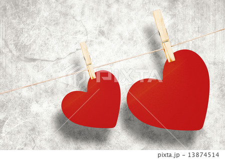 Composite image of hearts hanging on a line Composite image of hearts hanging on a line 13874514