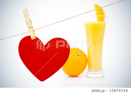 Composite image of heart hanging on line 13874539