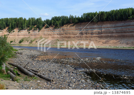 Geological outcrop on the riverbank Geological outcrop on the riverbank 13874695