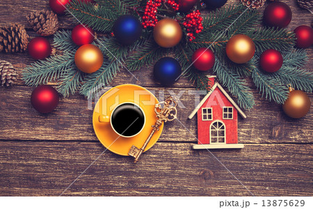 Hot coffee on a table near pine branches with chritmas balls 13875629