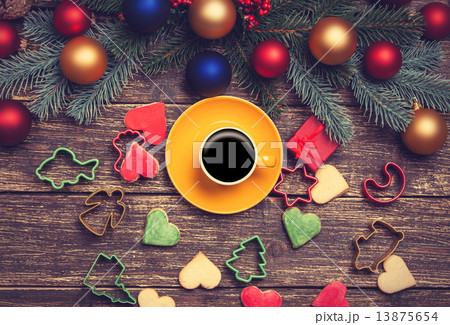 Hot coffee on a table near pine branches with chritmas balls 13875654