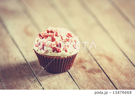 Cream cake on a wooden table. Cream cake on a wooden table. 13876668