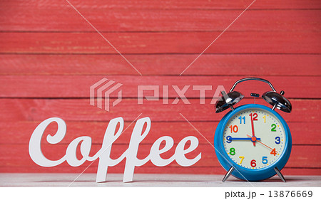 Alarm clock and wooden word Coffee. 13876669