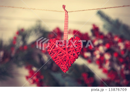 Heart shape toy hanging on the thread Heart shape toy hanging on the thread 13876709