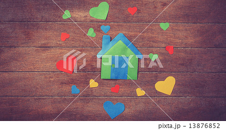 Paper house on wooden table. Paper house on wooden table. 13876852