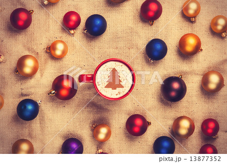 cappuccino and with red, blue and gold christmas balls cappuccino and with red, blue and gold christmas balls 13877352
