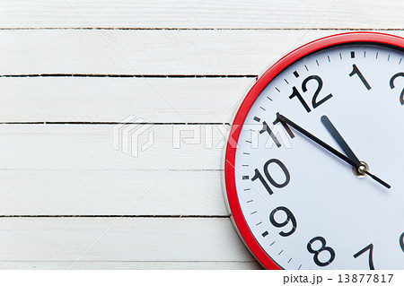 Huge clock on a table. 13877817