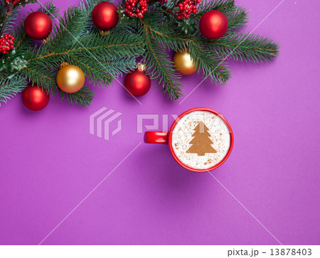 cappuccino and christmas gifts with pine branch on violet backgr cappuccino and christmas gifts with pine branch on violet backgr 13878403