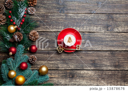 Cappuccino with christmas tree shape and pine branch on wooden t 13878676