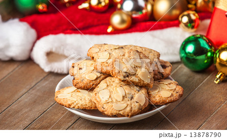Cookies with christmas gifts on wooden table Cookies with christmas gifts on wooden table 13878790