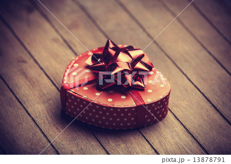 Heart shape valentine box handmade on wooden background 13878791