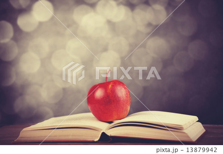 Apple and the book. Apple and the book. 13879942