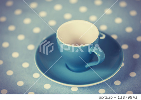 Cup of a coffe on polka dot cover Cup of a coffe on polka dot cover 13879943