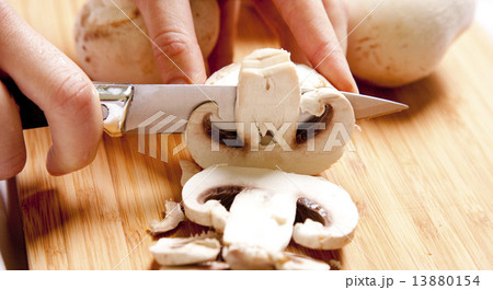 Mushrooms cutting 13880154