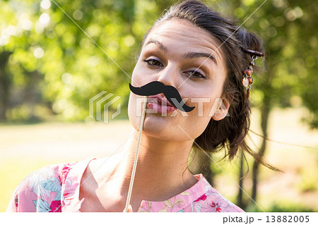 Pretty brunette with fake mustache 13882005