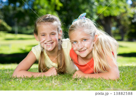 Happy sisters smiling at camera 13882588