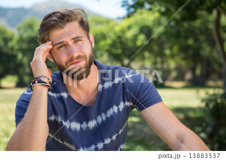 Handsome hipster getting a headache Handsome hipster getting a headache 13883537