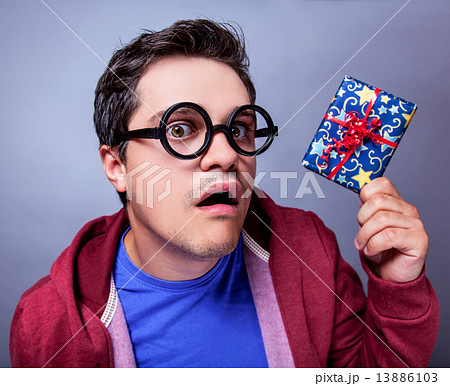 Crazy man with gift. 13886103
