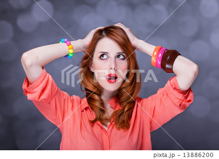 Surprised redhead girl 13886200