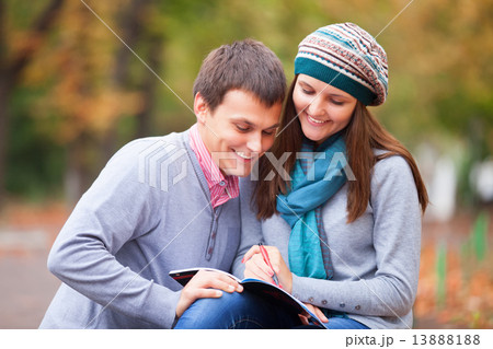 Teen couple at autumn park 13888188