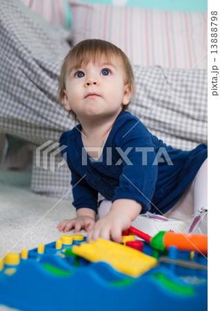 Little girl playing 13888798