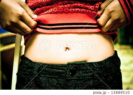Pull-up show navel of young woman Pull-up show navel of young woman 13889510