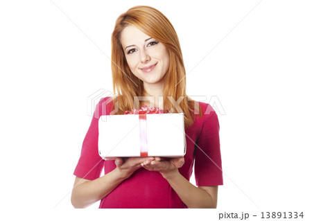Beautiful red-haired girl with present box Beautiful red-haired girl with present box 13891334