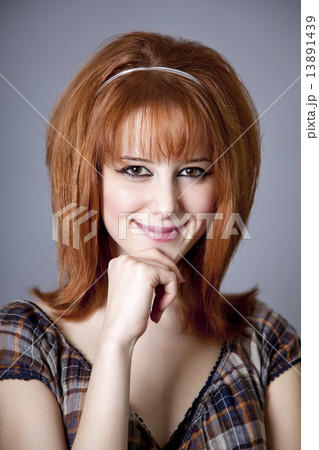 Portrait of red-haired girl. 60s style. 13891439